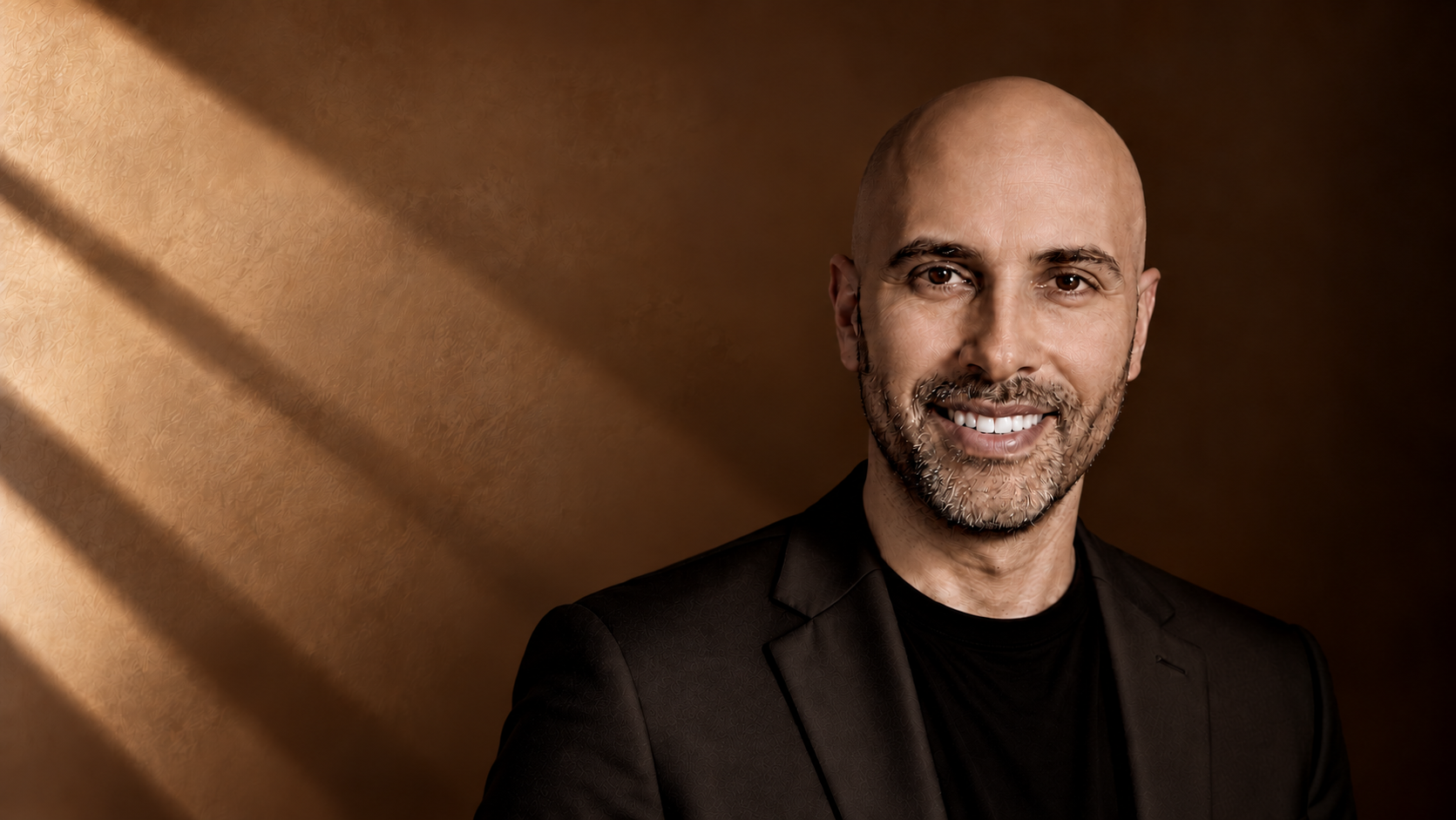 Portrait of Orcun Onur in warm editorial light